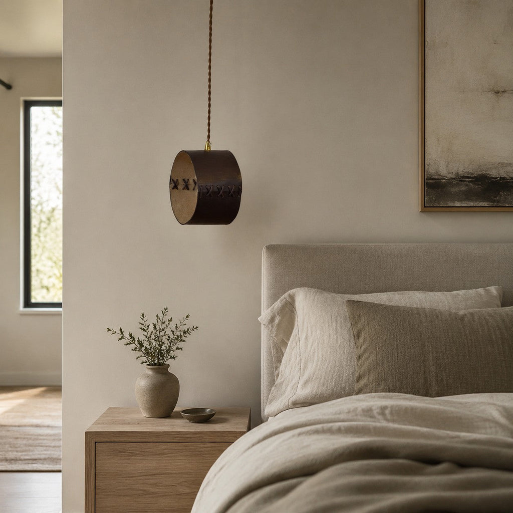 Cylinder Pendant Light — Hand-Laced Leather, Compact Silhouette, Warm Interior Shade