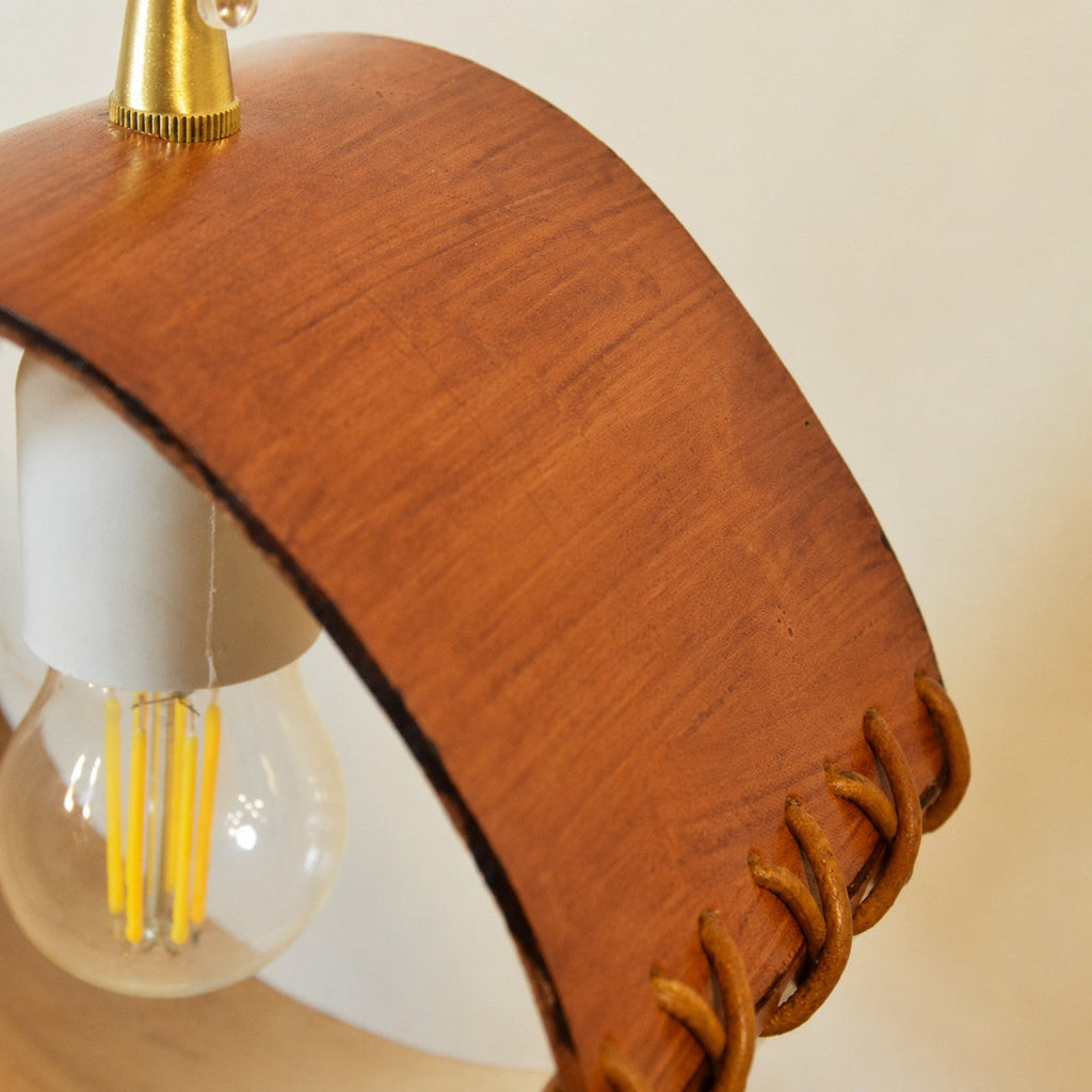 Cylinder Pendant Light — Hand-Laced Leather, Compact Silhouette, Warm Interior Shade