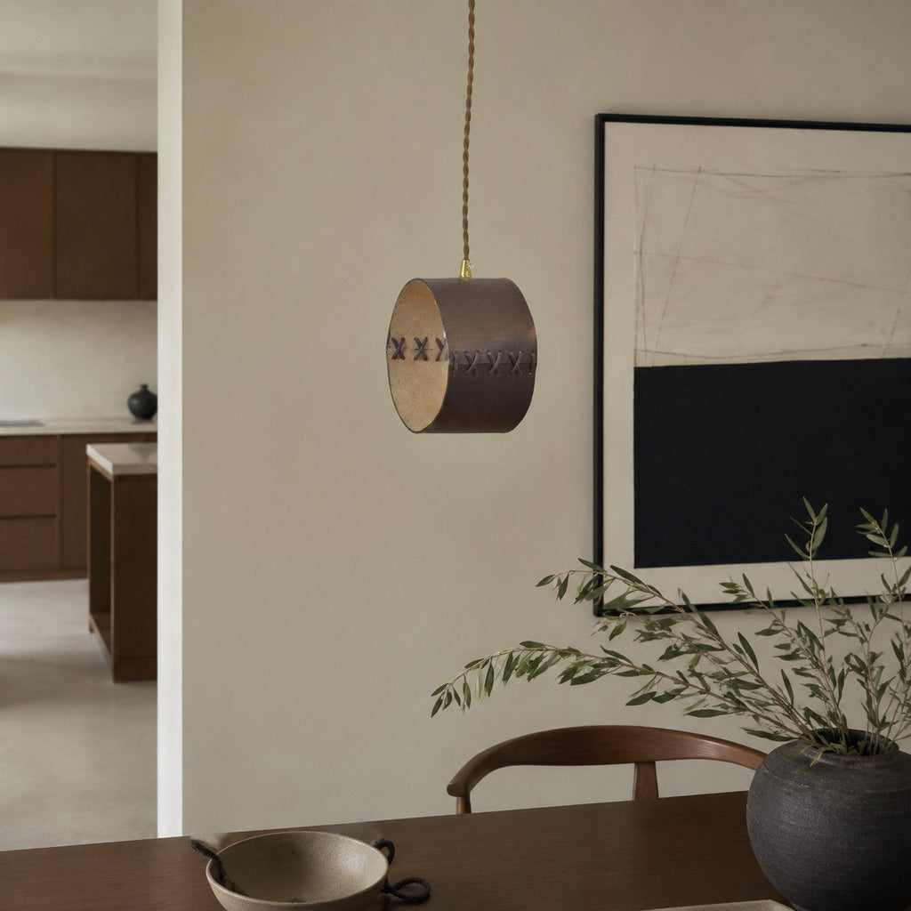 Cylinder Pendant Light — Hand-Laced Leather, Compact Silhouette, Warm Interior Shade