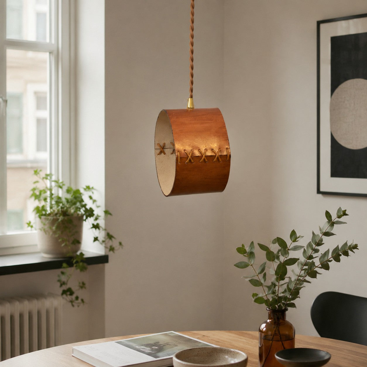 Cylinder Pendant Light — Hand-Laced Leather, Compact Silhouette, Warm Interior Shade