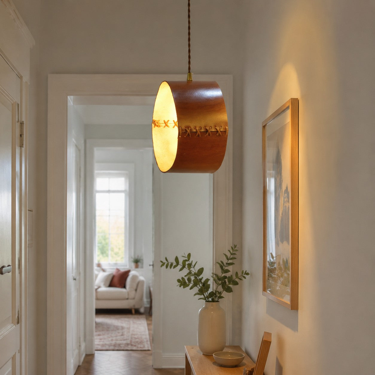 Cylinder Pendant Light — Hand-Laced Leather, Compact Silhouette, Warm Interior Shade