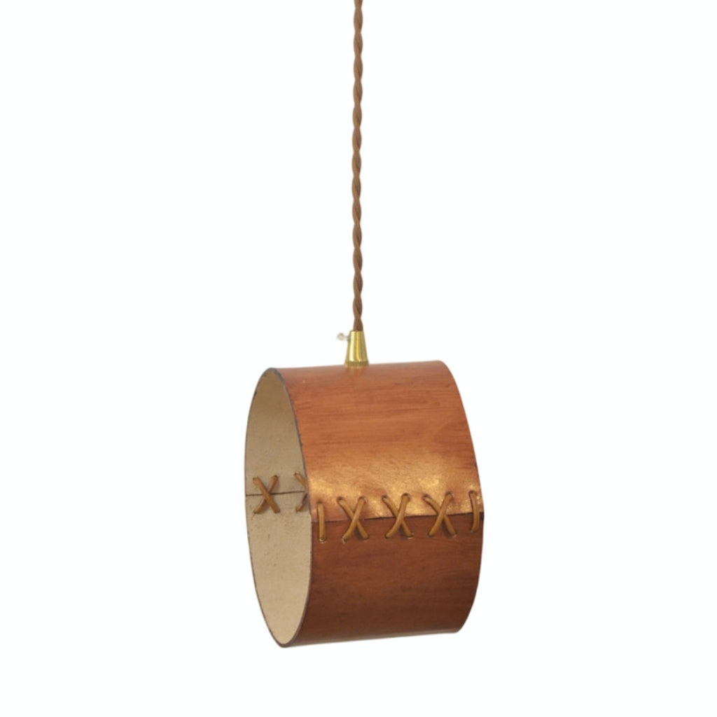 Cylinder Pendant Light — Hand-Laced Leather, Compact Silhouette, Warm Interior Shade