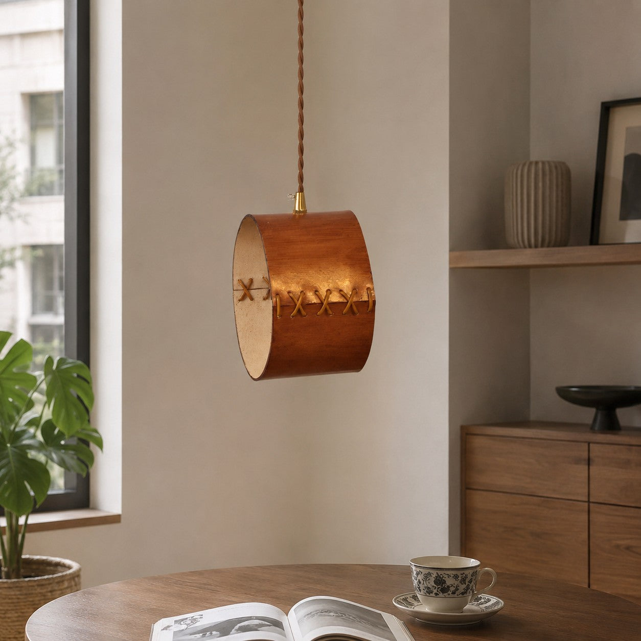 Cylinder Pendant Light — Hand-Laced Leather, Compact Silhouette, Warm Interior Shade