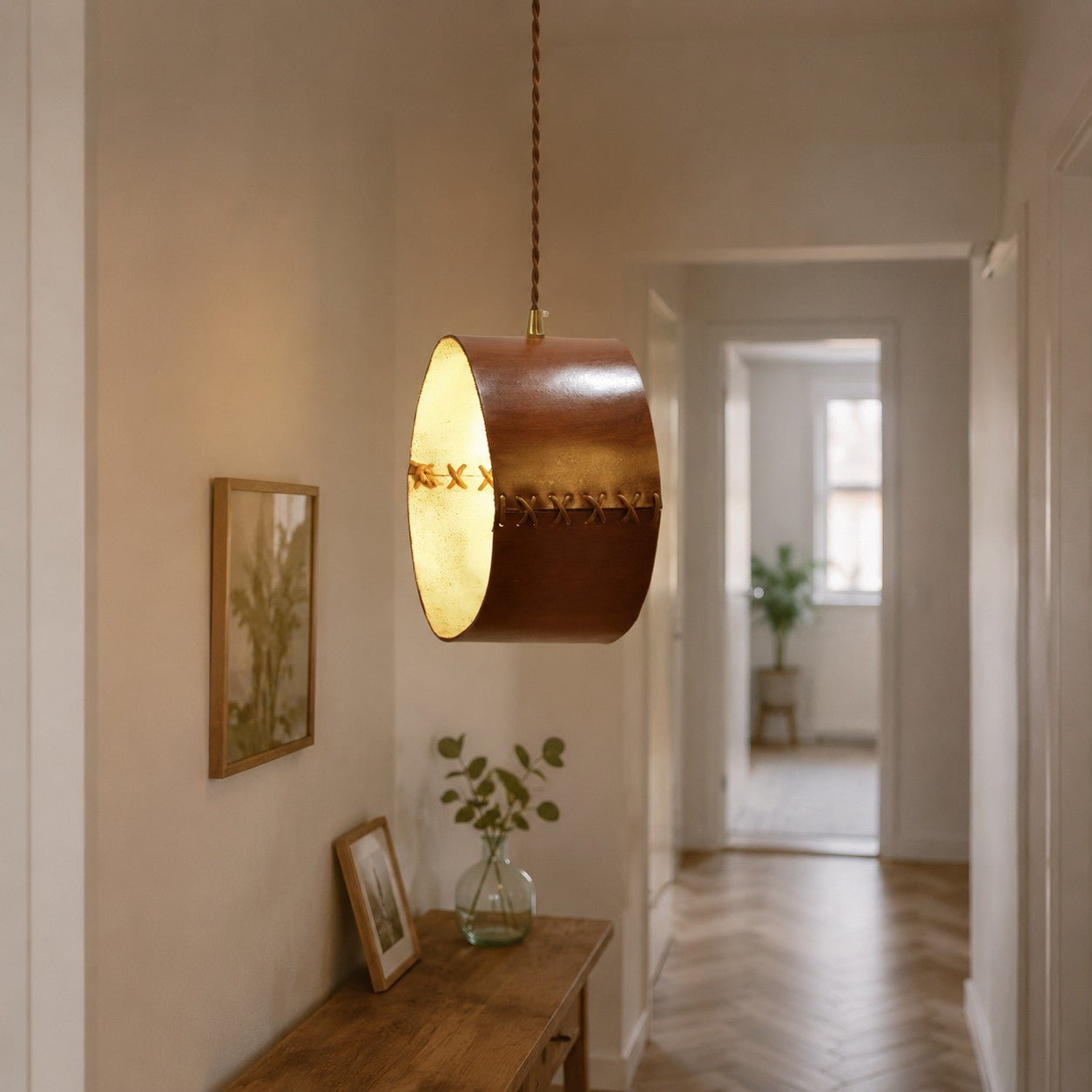Cylinder Pendant Light — Hand-Laced Leather, Compact Silhouette, Warm Interior Shade