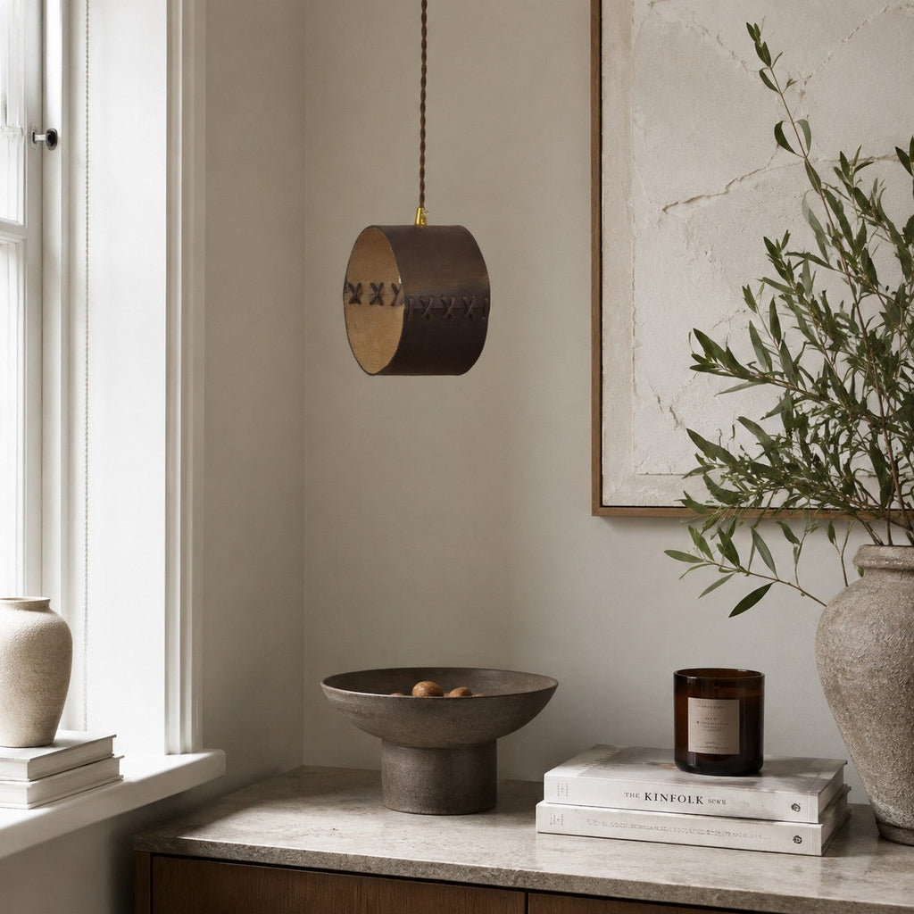 Cylinder Pendant Light — Hand-Laced Leather, Compact Silhouette, Warm Interior Shade