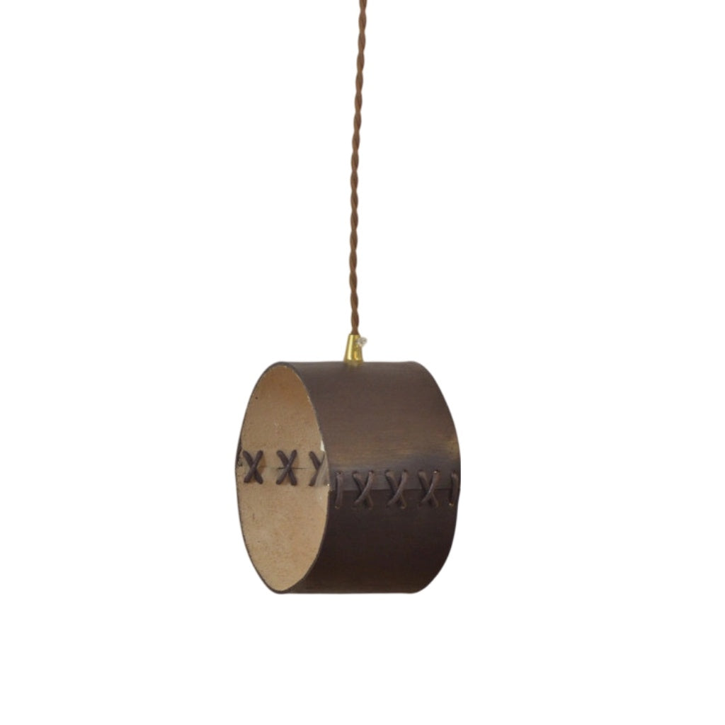 Cylinder Pendant Light — Hand-Laced Leather, Compact Silhouette, Warm Interior Shade